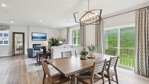 Open main level with dinette and sliding glass doors