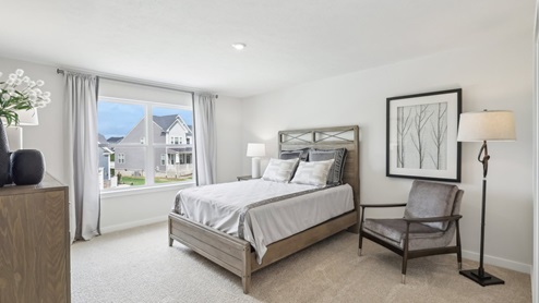 Secondary bedroom with two large windows