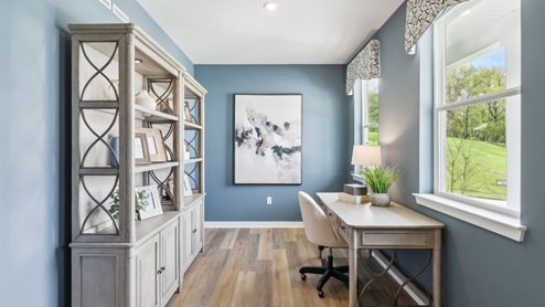 Front flex room with large windows
