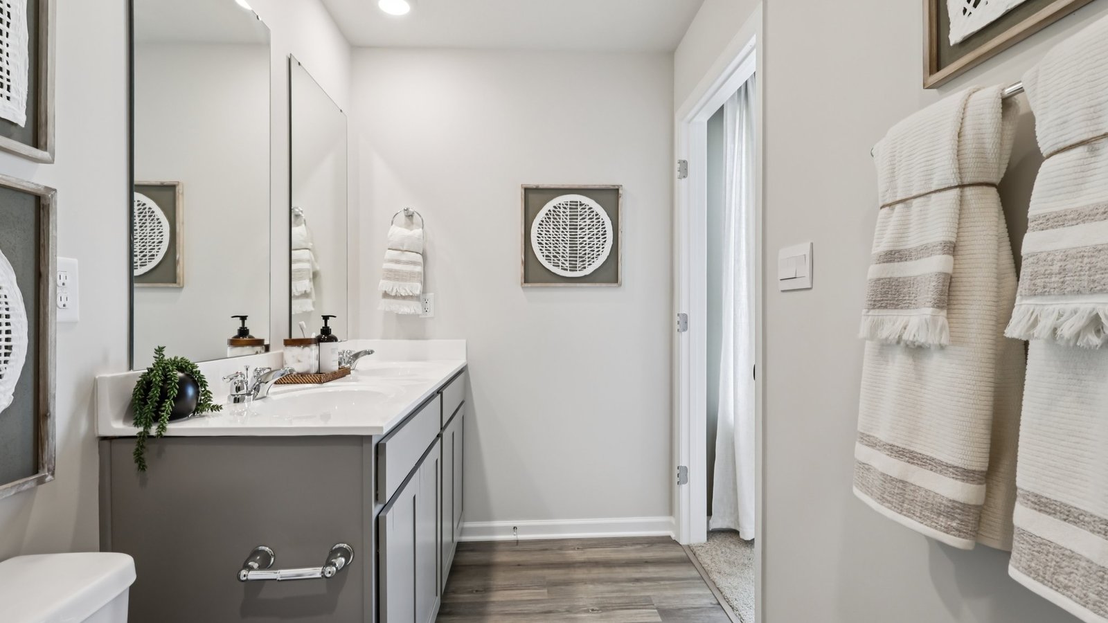 primary ensuite bathroom with window