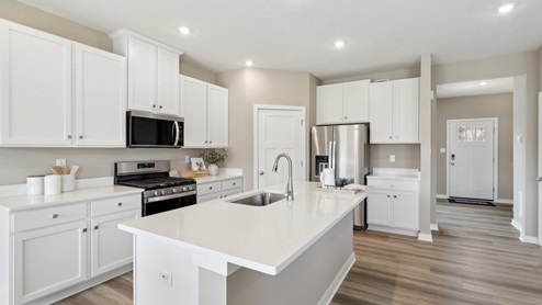 kitchen with white cabinets and ocuntertops