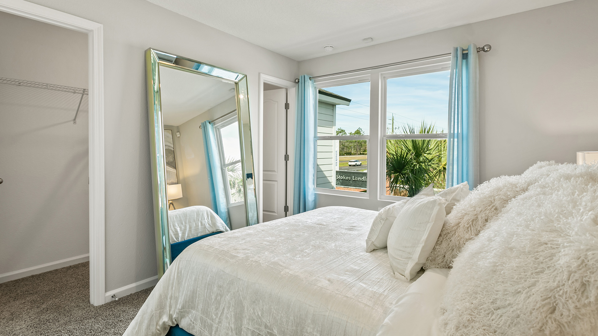 Interior bedroom with large windows