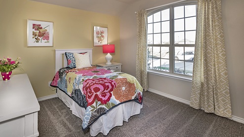 Secondary bedroom with childrens furniture