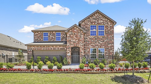5044 Blazer Way at Fireside by the Lake in Garland, TX exterior of two story model home