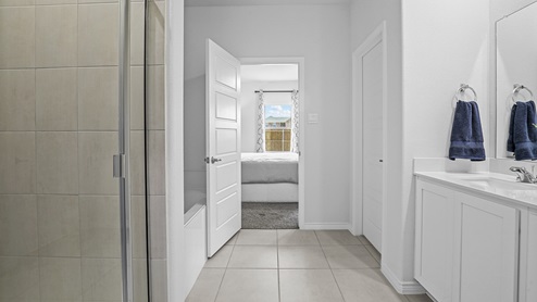 5044 Blazer Way at Fireside by the Lake in Garland, TX primary bedroom bathroom