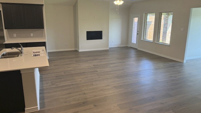 open concept living area with hardwood floors