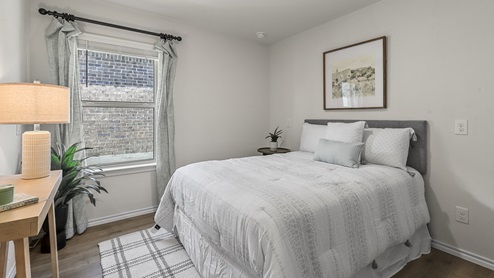 1304 Quest Bridge Road secondary bedroom with queen bed