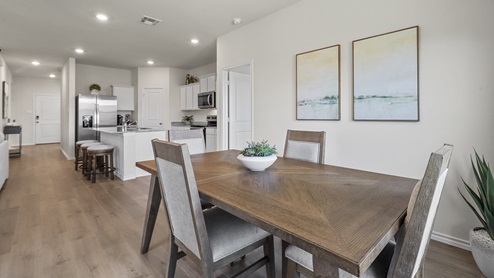 1304 Quest Bridge Road dining area with view of kitchen with hardwood floors