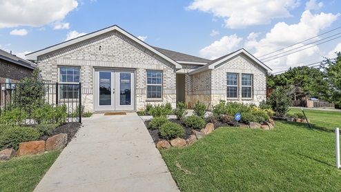 1304 Quest Bridge Road exterior of one story model unity with beautiful brick
