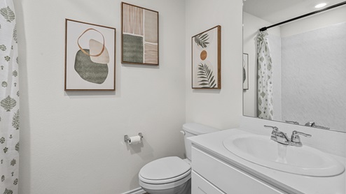 1304 Quest Bridge Road secondary bathroom with white cabinets and counters
