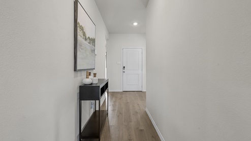 1304 Quest Bridge Road Model interior entry with hardwood floors and white walls