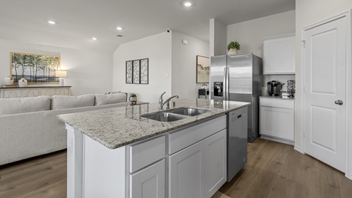 1304 Quest Bridge Road Model Kitchen island with view of open concept living area