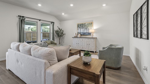 1304 Quest Bridge Road open concept living area with hardwood floors and natural lighting