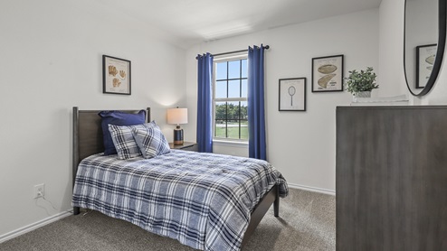 1308 Quest Bridge Road secondary bedroom with natural lighting and carpet