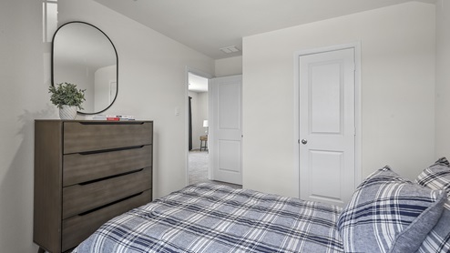 1308 Quest Bridge Road secondary bedroom with natural lighting and carpet