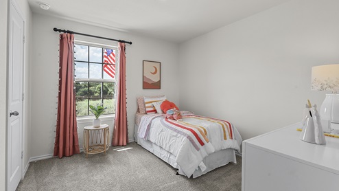 1308 Quest Bridge Road secondary bedroom with natural lighting and carpet