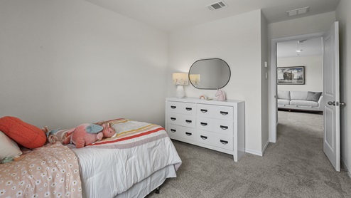 1308 Quest Bridge Road secondary bedroom with natural lighting and carpet