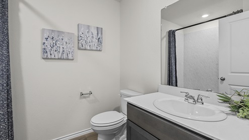 1308 Quest Bridge Road secondary bedroom with natural lighting and carpet