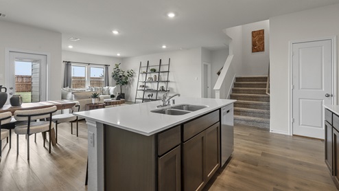 1308 Quest Bridge Road granite kitchen island with view of open concept living area