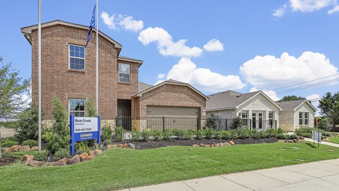 Bear Creek Ranch model in Lancaster, TX exterior of both one and two story model home