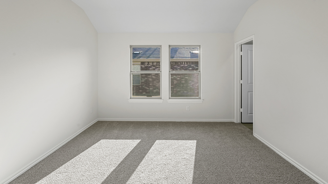 secondary bedroom with double window