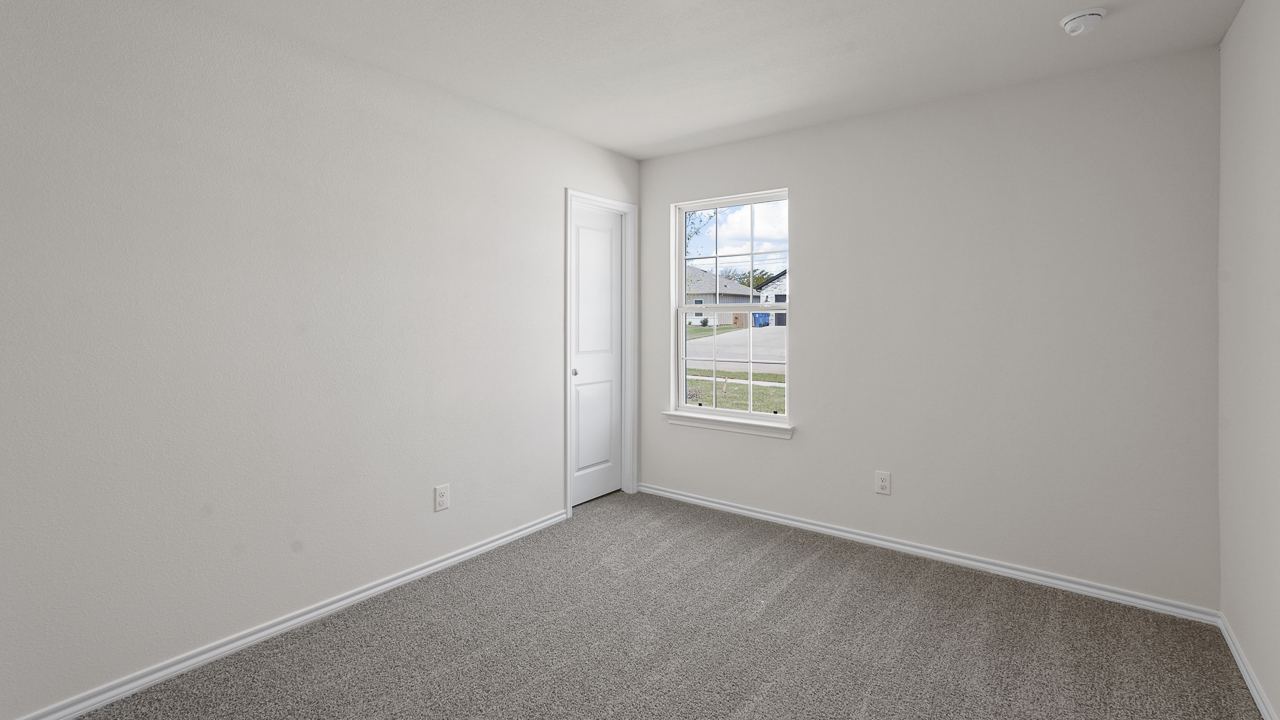 large bedroom with window