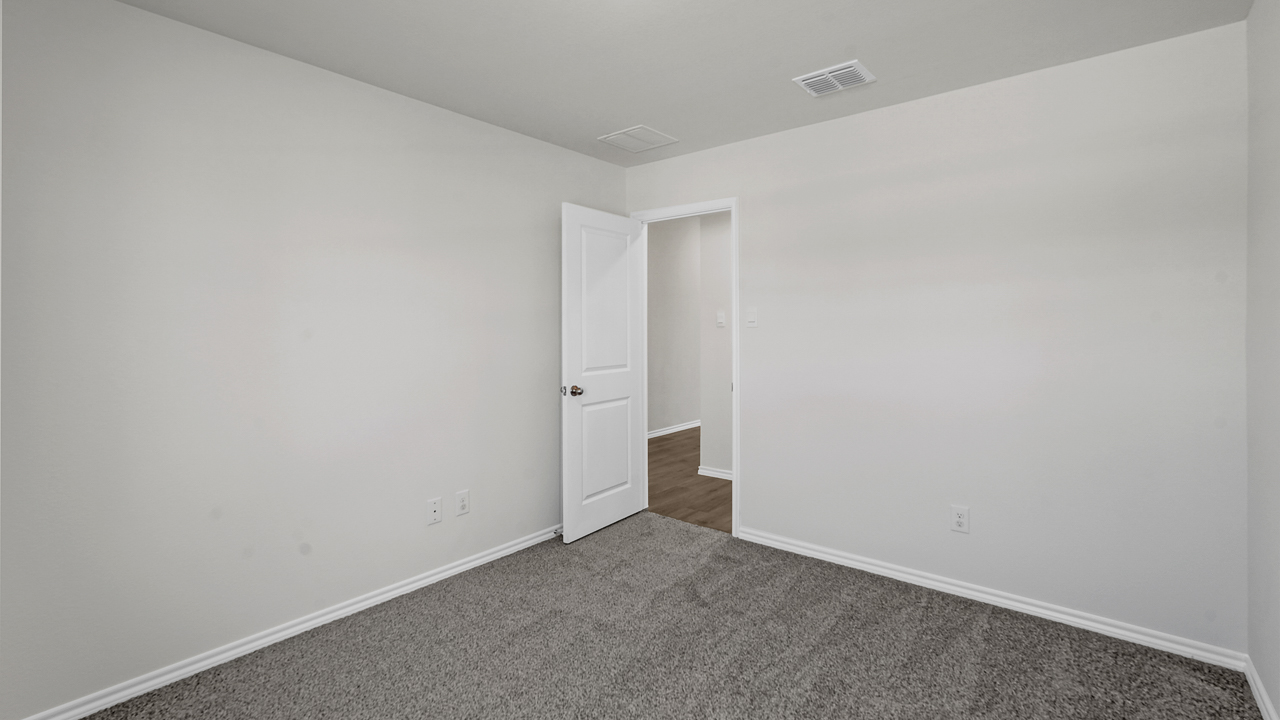 large bedroom with window