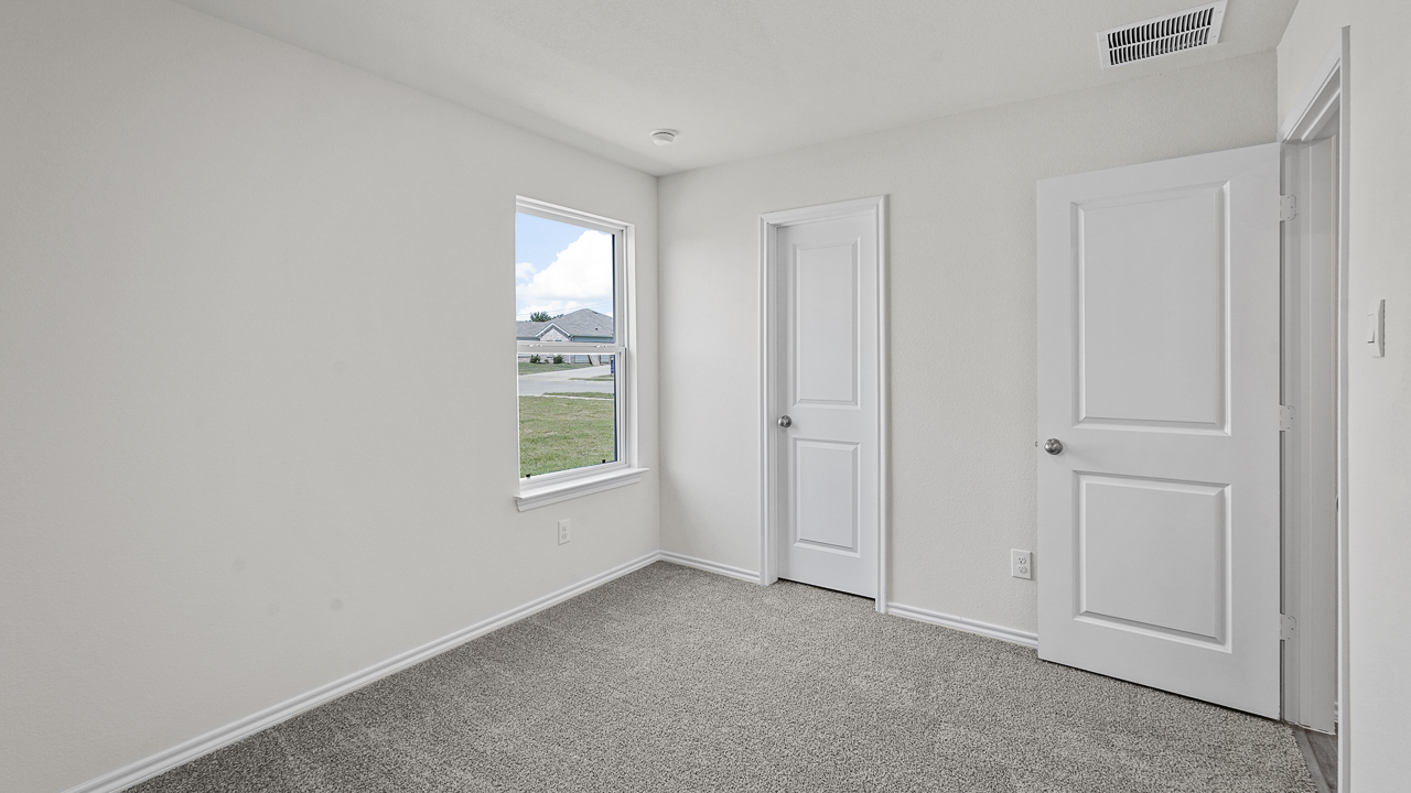 large bedroom with window