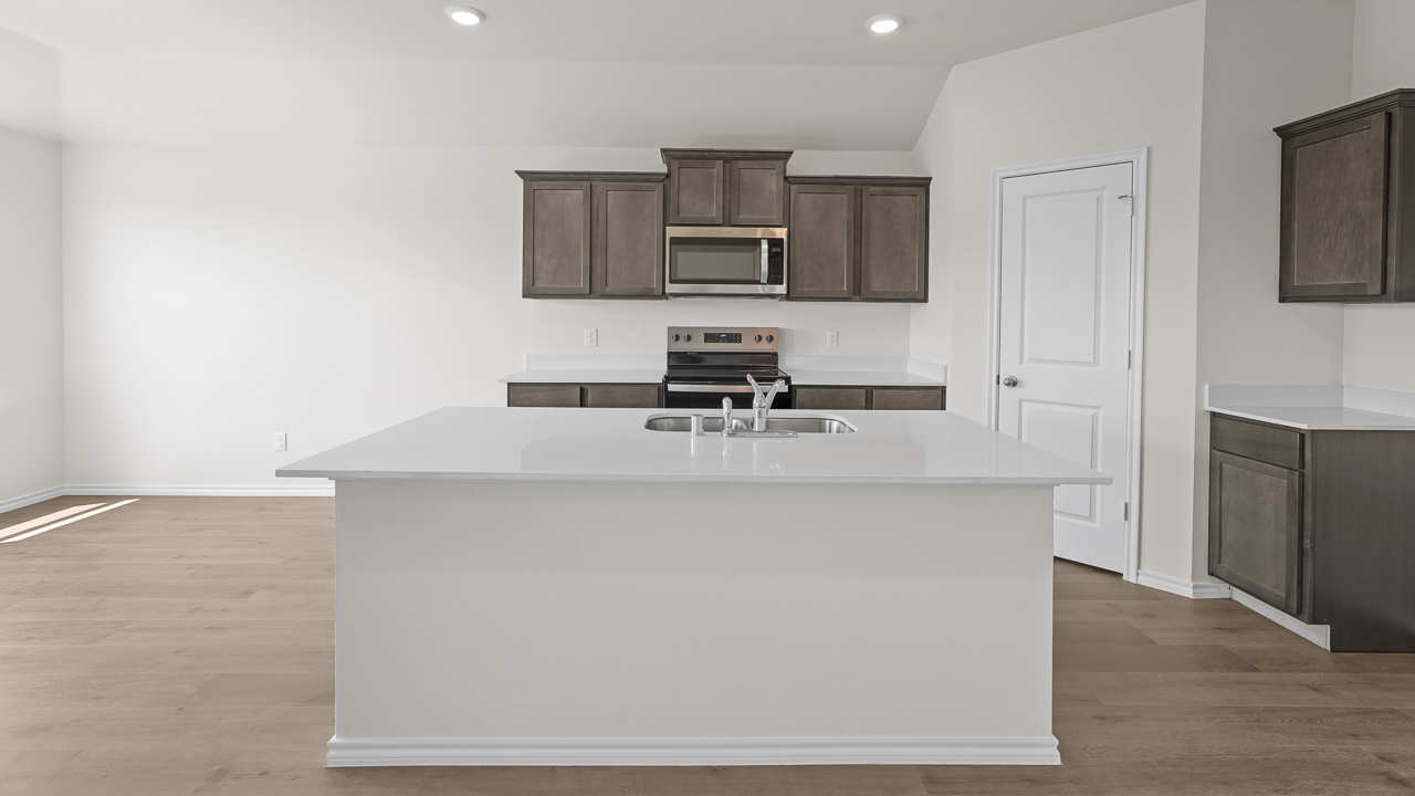 kitchen island a cabinets with large walk in pantry