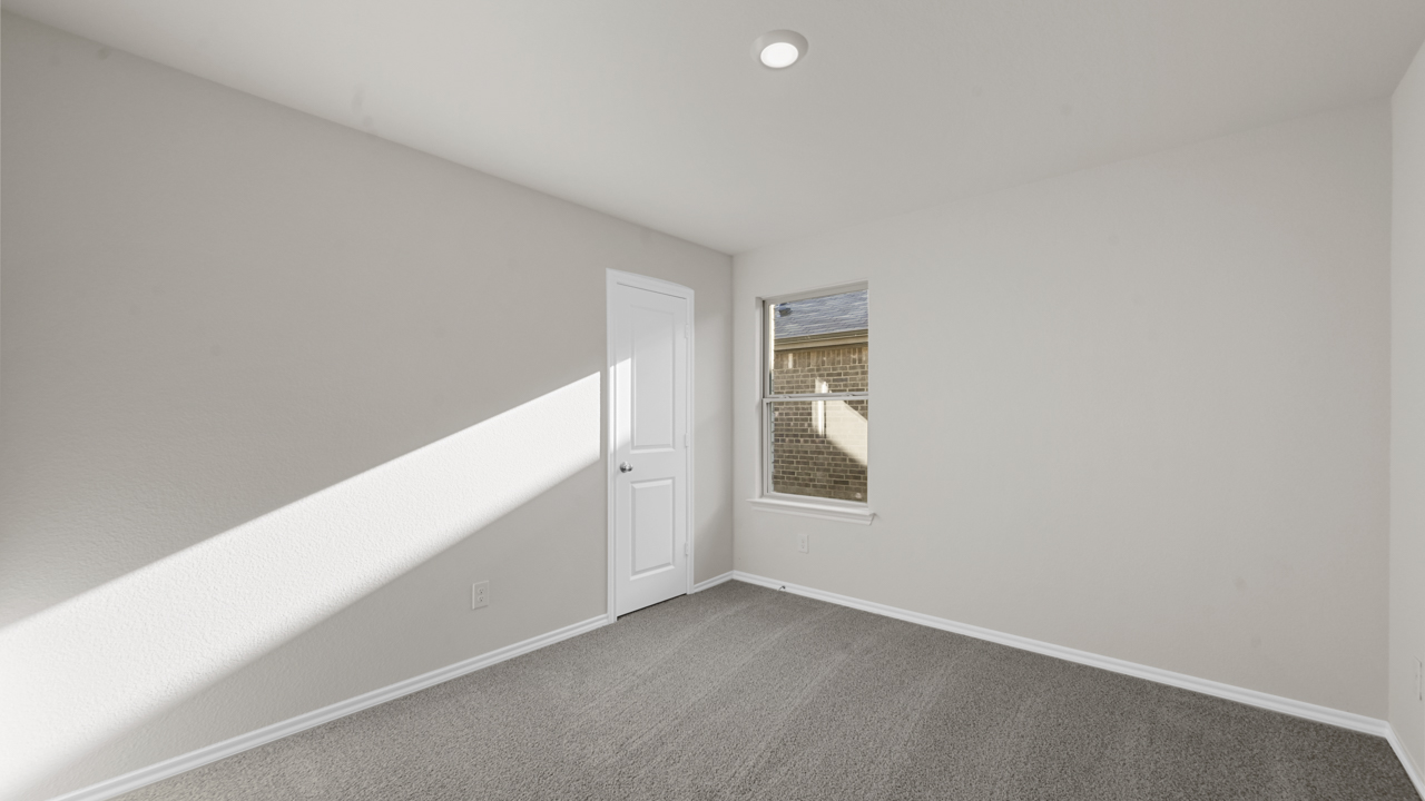 large bedroom with window