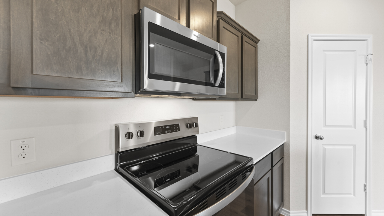 close up of stainless steel microwave and oven