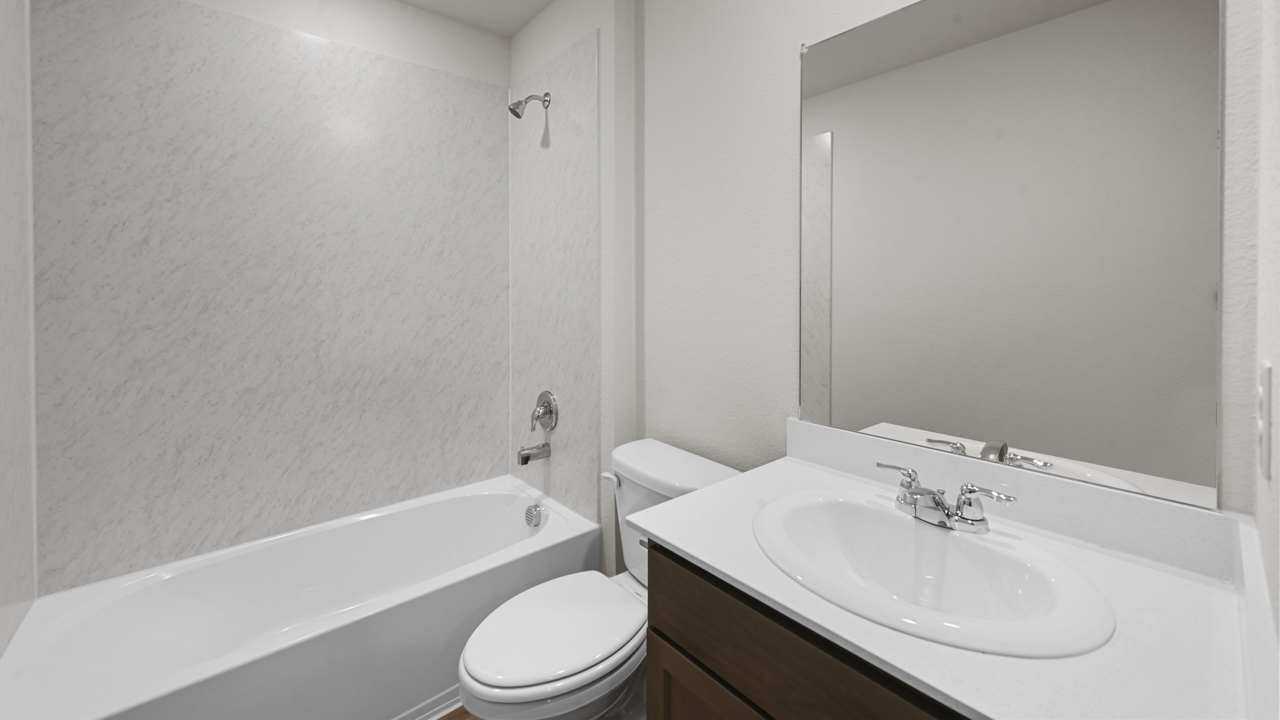 primary bathroom with vanity and sink