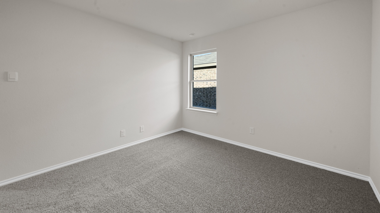 large bedroom with window