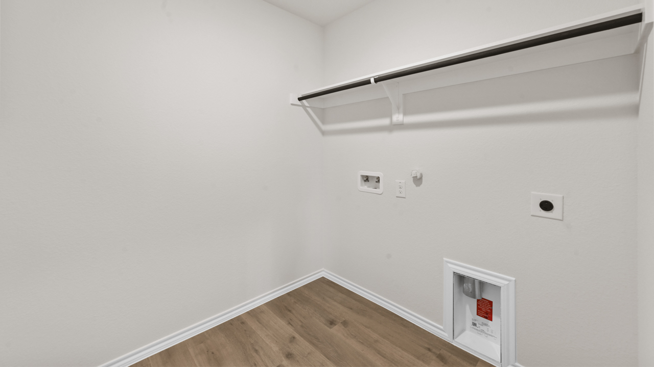 utility room with hanging rod