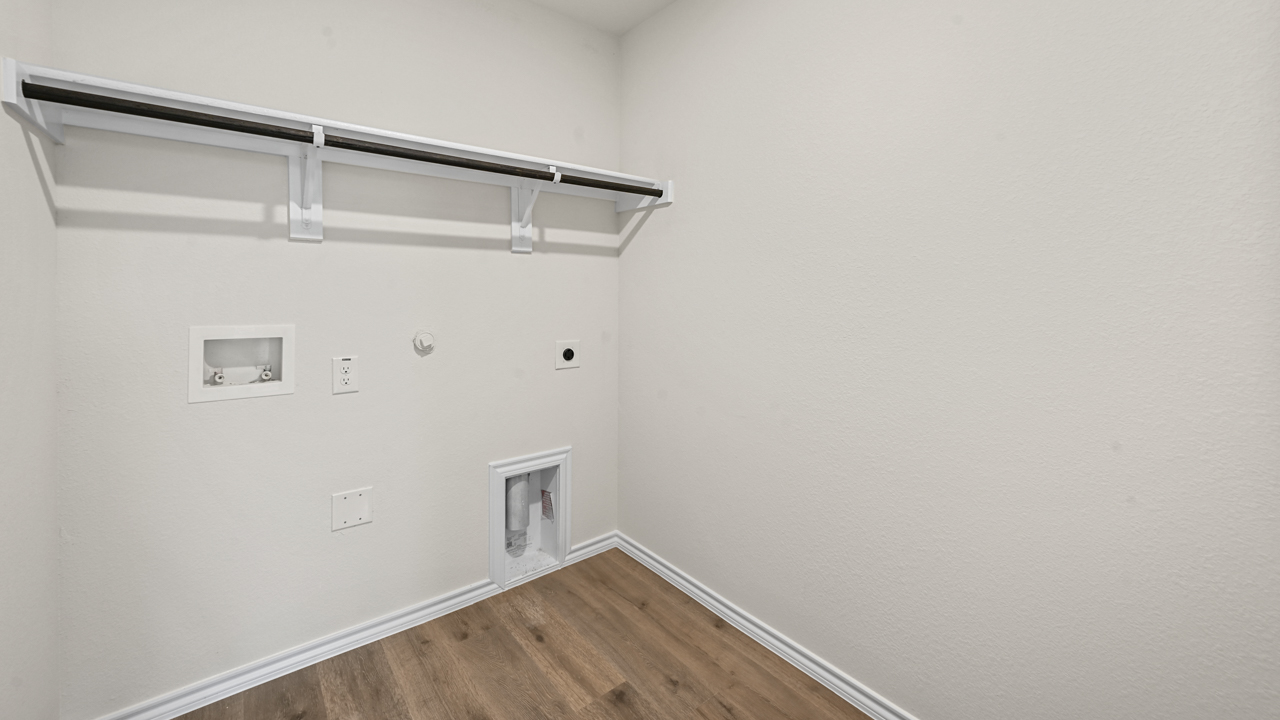 utility room with hanging rod