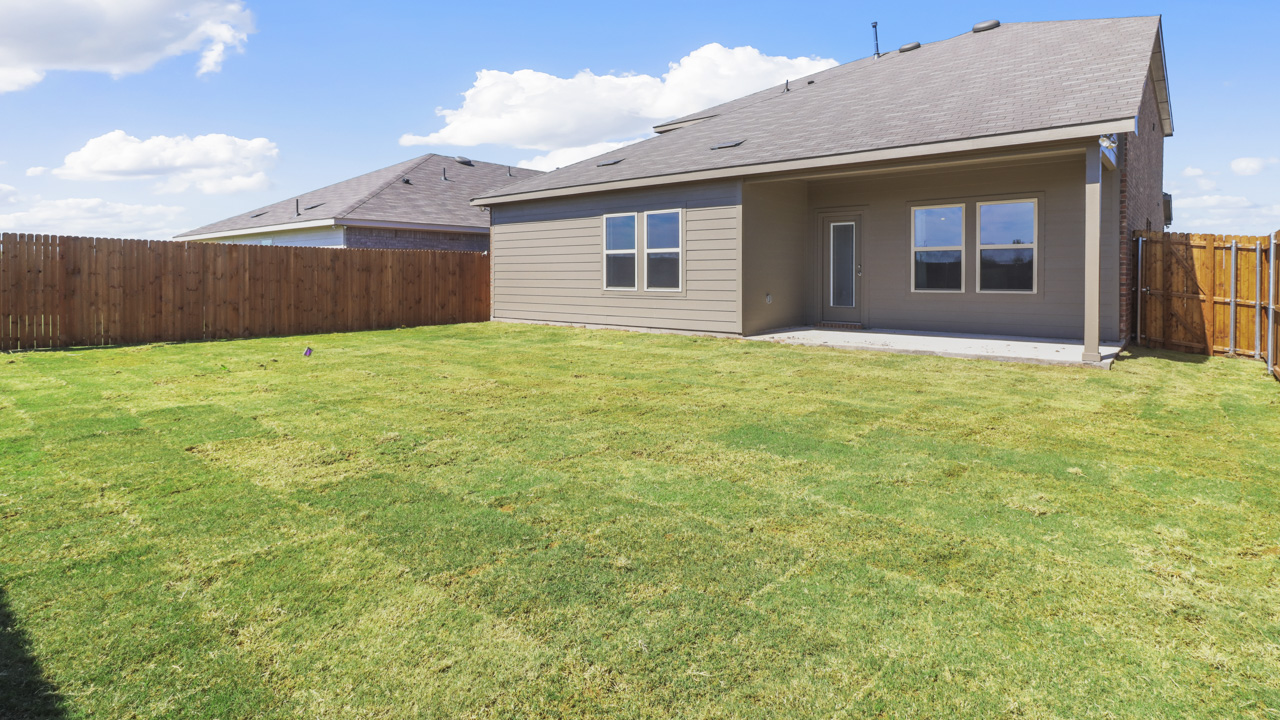 back exterior of home with siding and covered patio