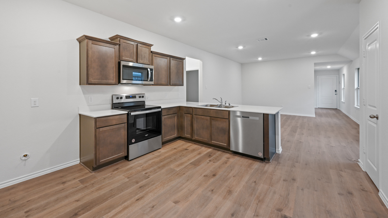 kitchen area with hardwood floors