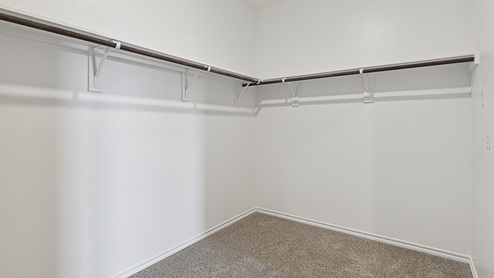 2015 Wildcat Trail model home at Wildcat Ranch in Crandall, TX primary bedroom closet