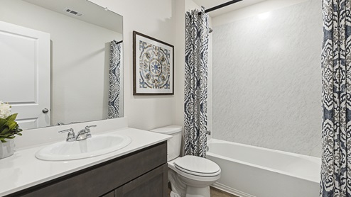 Model home - 2017 Wildcat Trail at Wildcat Ranch in Crandall, TX secondary bathroom