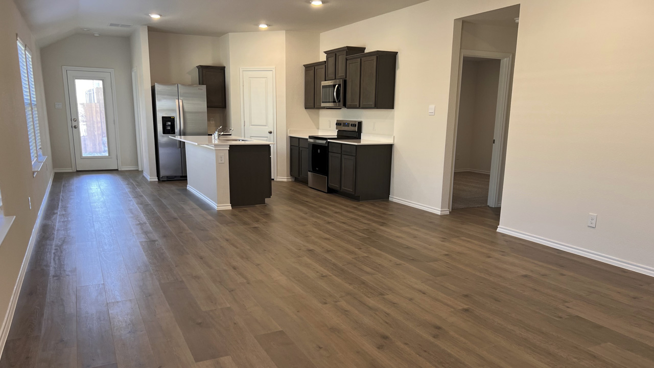 open concept living area with hardwood floors