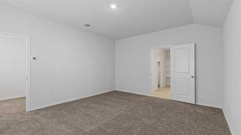 X30E primary bedroom with carpet