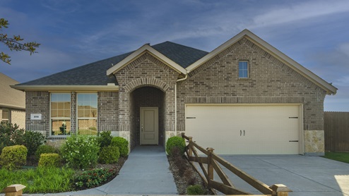 One story model home with beautiful landscaping