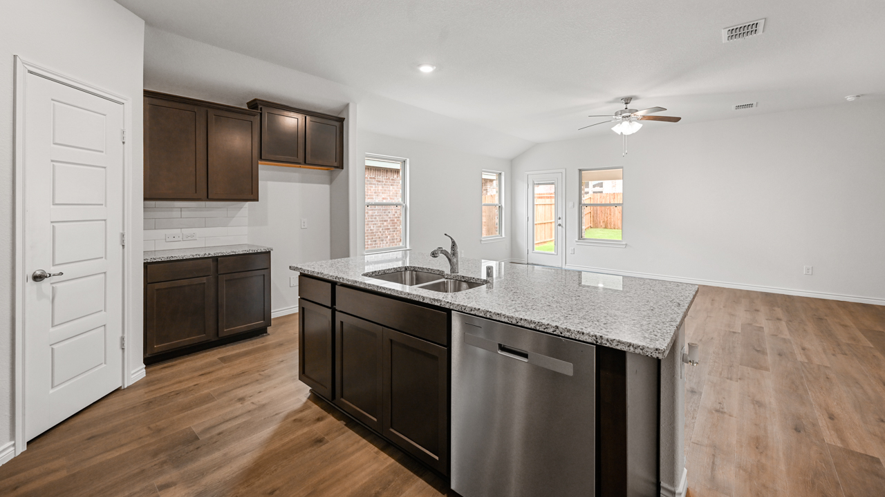 kitchen with dark cabinets