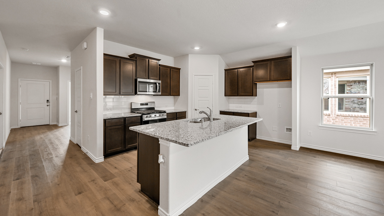 kitchen with dark cabinets