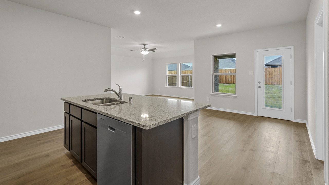 kitchen island overlooking breakfast nook and back door