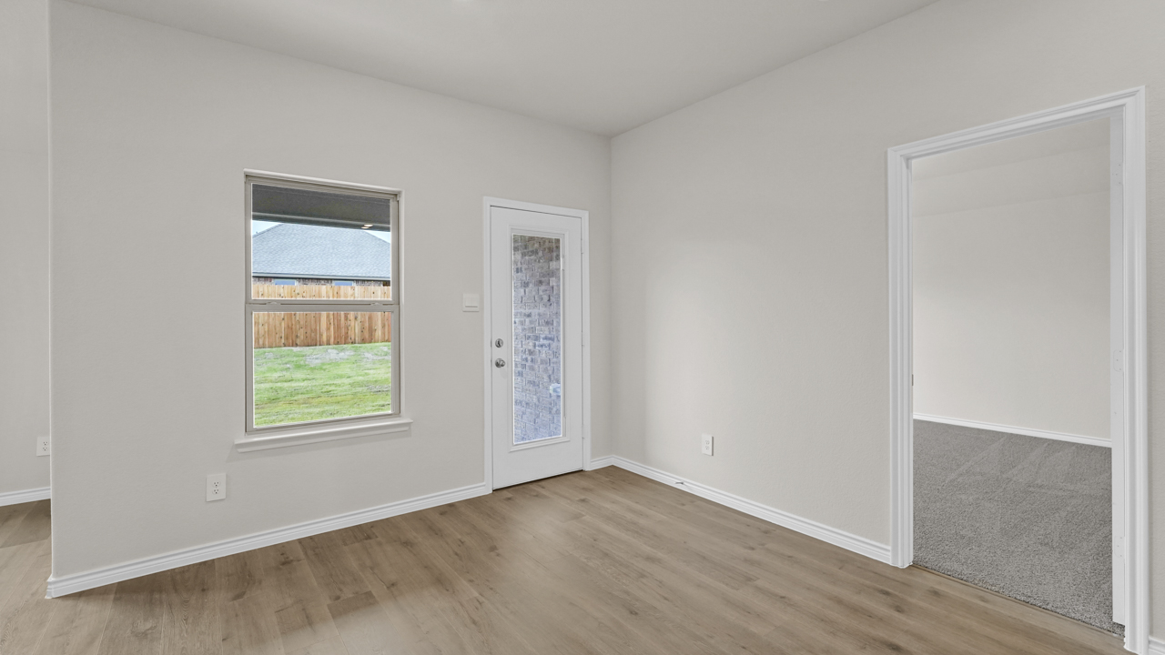 breakfast nook with window and back door