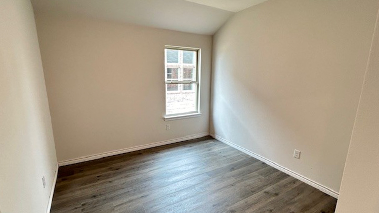 study area with hardwood floors