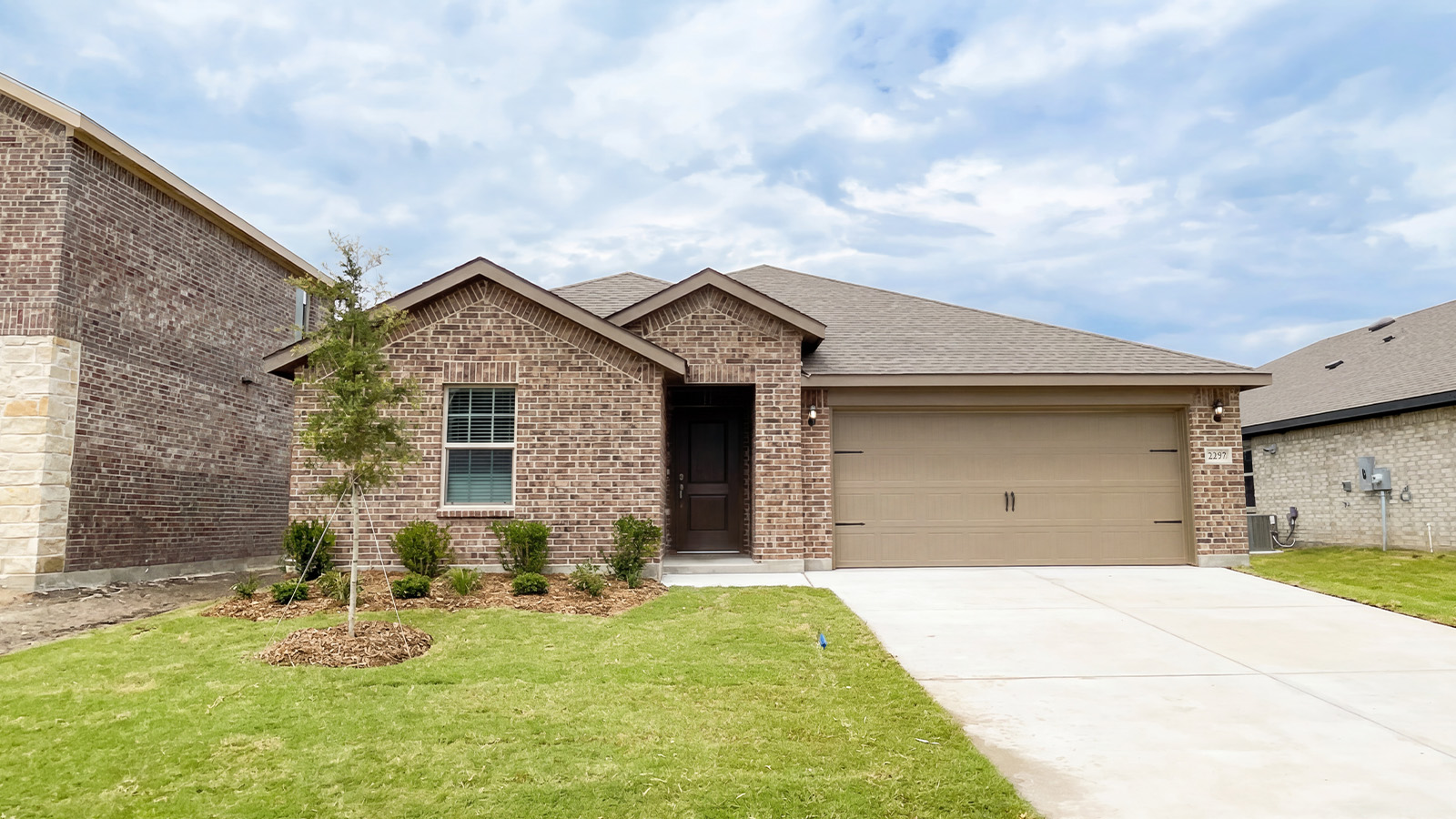exterior with brick and stone