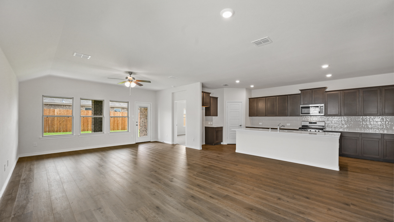 kitchen with island and living room