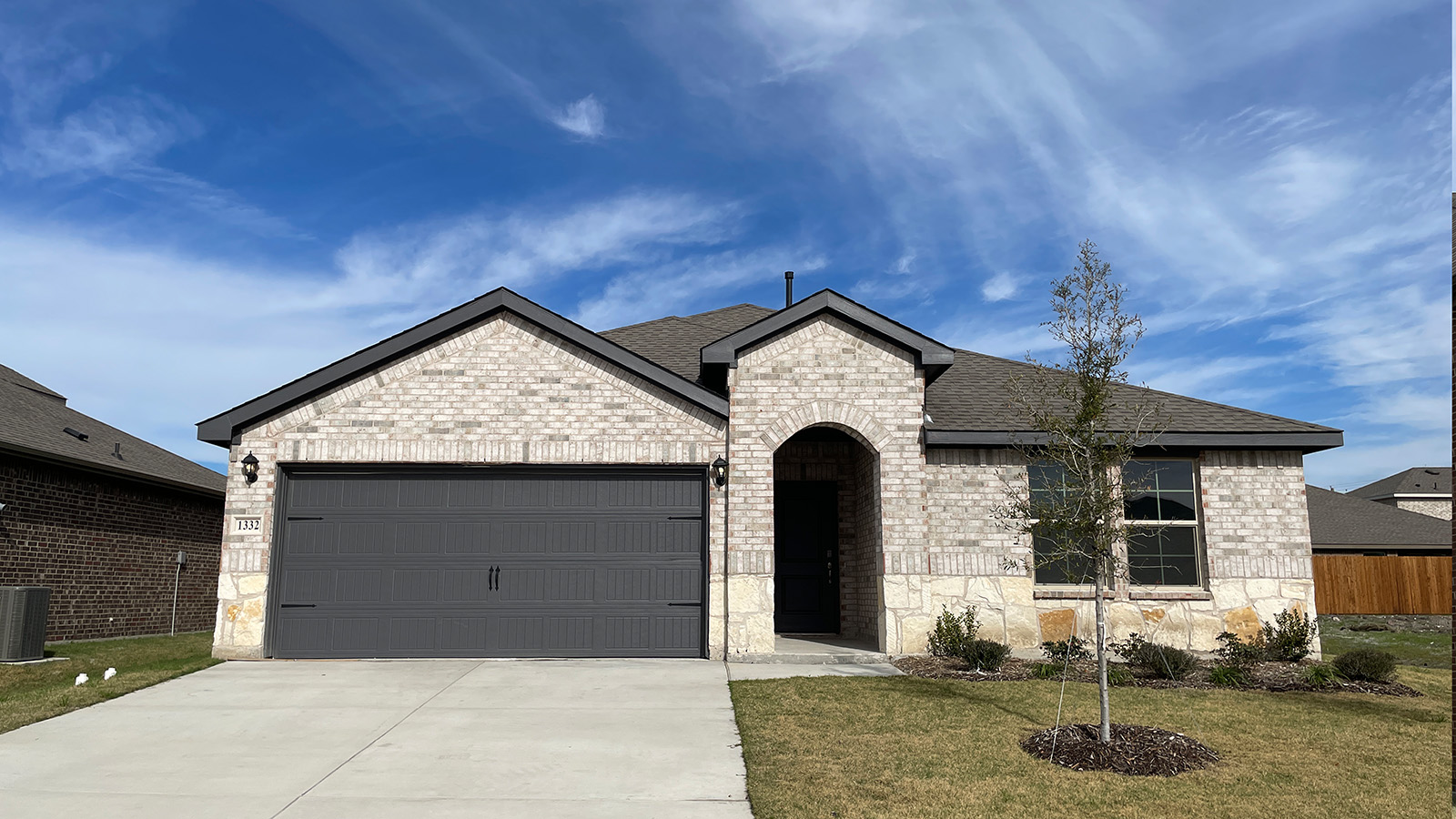 single story home with 2 car garage